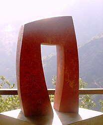 Sculpture from red travertine