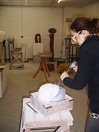 Helle from Denmark carving the marble