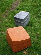 Two sitting stones from travertine and marble