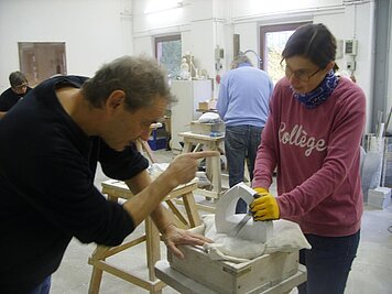 Helle sanding, shortly before finishing her sculpture